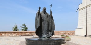 Statue of John Paul II in front of St. Emmeram's Cathedral.