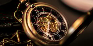 A gold pocket watch.