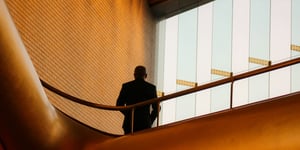 Businessman on a staircase.