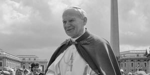 A black and white picture of Pope John Paul II.