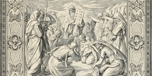 Moses holding the Ten Commandments on Mount Sinai.