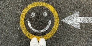 A smiley face on the ground. 