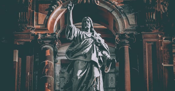 A statue of Jesus giving a blessing.